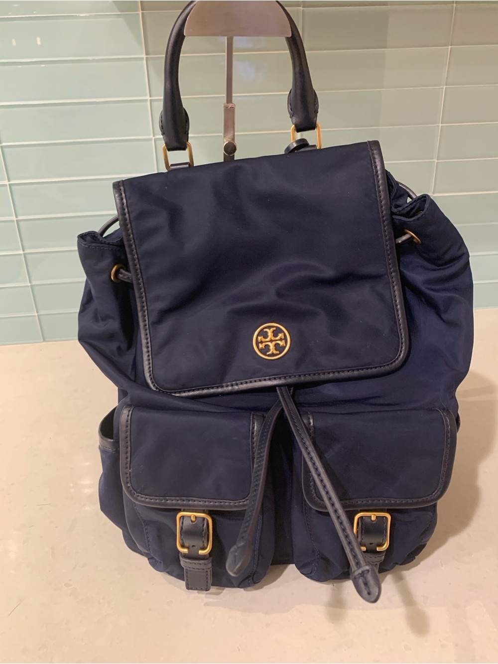 Tory Burch Navy Nylon Drawstring Flap Backpack with Gold Logo Accent No Flaw